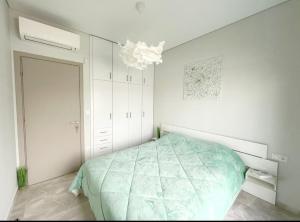 A bed or beds in a room at Luxury Apartment Nikiti Olea Valley