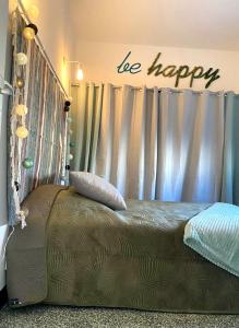 Posteľ alebo postele v izbe v ubytovaní La p'tite HAPPY