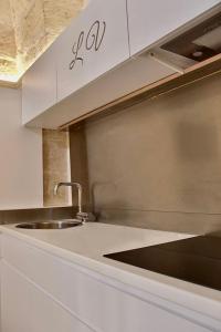 A kitchen or kitchenette at LeVolte luxury suite&spa