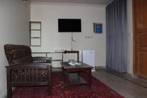 TV a/nebo společenská místnost v ubytování Hotel Le Meridien