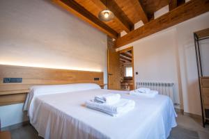 Postel nebo postele na pokoji v ubytování Casa Ronda
