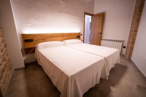 Postel nebo postele na pokoji v ubytování Casa Ronda