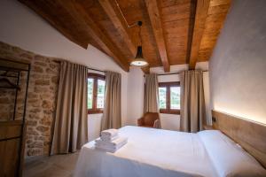 Postel nebo postele na pokoji v ubytování Casa Ronda
