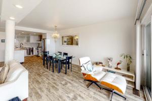 a living room with a couch and a table at Oceanview Paradise in Watsonville