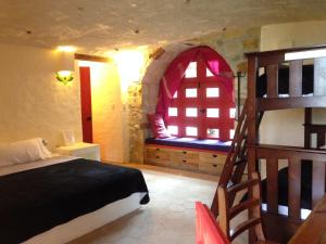 Postel nebo postele na pokoji v ubytování Hotel Posada Primavera
