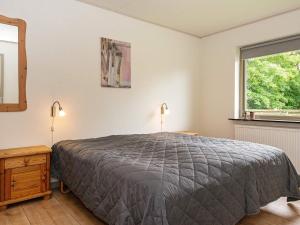 Postel nebo postele na pokoji v ubytování Holiday home Struer XXIII