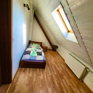 Postel nebo postele na pokoji v ubytování HARMONY Apartments