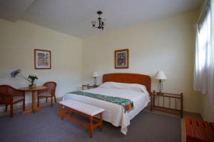 A bed or beds in a room at Villa Caltengo