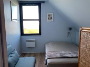 Posedenie v ubytovaní Duplex avec balcon, parking, animaux admis, et Wi-Fi - FR-1-675-2
