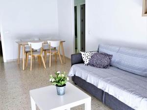 a living room with a couch and a table at Beautiful apartment in San Fernando near lake in San Fernando