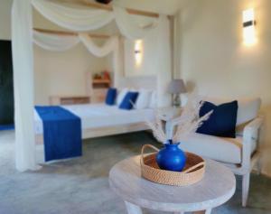 Letto o letti in una camera di Anukama Resort