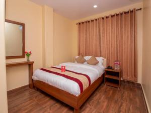 A bed or beds in a room at Hotel Dream Light