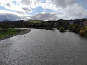 a view of a river from a bridge at APARTAMENTO PIRAGUAS in Arriondas
