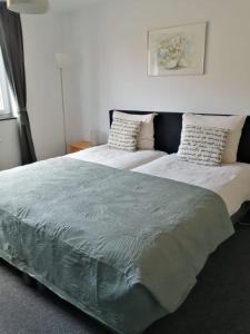 Postel nebo postele na pokoji v ubytování B&B L'ourthe