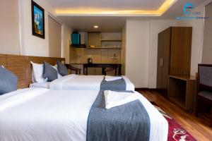 Postel nebo postele na pokoji v ubytování Hotel Dreams connect GRB