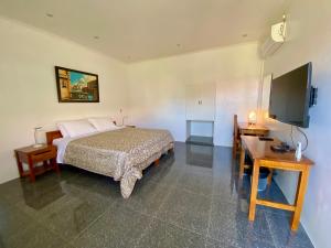 Postel nebo postele na pokoji v ubytování Strutz Art Garden Resort
