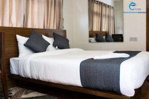 Postel nebo postele na pokoji v ubytování Hotel Dreams connect GRB
