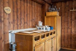 Kuchyň nebo kuchyňský kout v ubytování Hotel Le Refuge