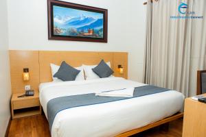 Postel nebo postele na pokoji v ubytování Hotel Dreams connect GRB