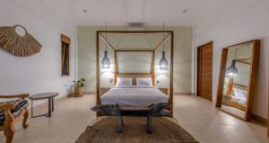 Ein Bett oder Betten in einem Zimmer der Unterkunft Villa Casa Orana