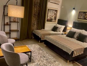 Voodi või voodid majutusasutuse 4Rooms 4U toas