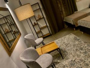 Voodi või voodid majutusasutuse 4Rooms 4U toas