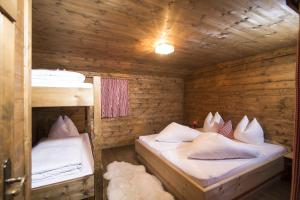 Posteľ alebo postele v izbe v ubytovaní Hütte - Ferienhaus Bischoferhütte für 2-10 Personen