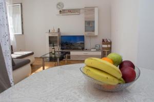 Televízia a/alebo spoločenská miestnosť v ubytovaní Apartment BUBA