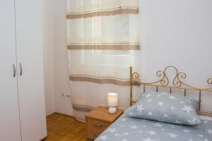 Posteľ alebo postele v izbe v ubytovaní Apartment BUBA