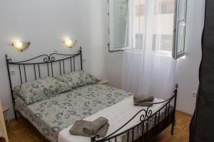 Posteľ alebo postele v izbe v ubytovaní Apartment BUBA