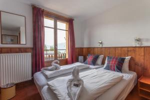 Postel nebo postele na pokoji v ubytování Hotel Le Refuge