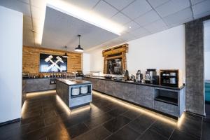 Kuchyň nebo kuchyňský kout v ubytování Hotel Fohnsdorf