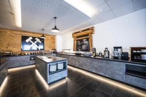 Kuchyň nebo kuchyňský kout v ubytování Hotel Fohnsdorf