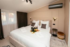 Postel nebo postele na pokoji v ubytování FK Luxury Penthouse