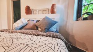 Łóżko lub łóżka w pokoju w obiekcie Willa Parzenica