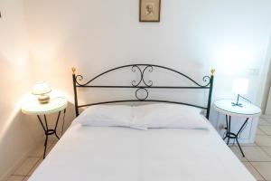 Postel nebo postele na pokoji v ubytování M310 - Marcelli, trilocale con terrazzo comodo ai servizi