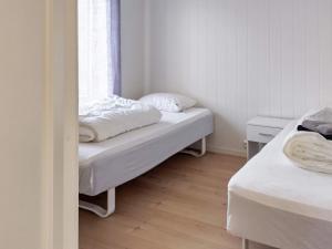 Katil atau katil-katil dalam bilik di Holiday home Leka III
