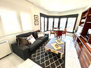 Posedenie v ubytovaní Apartamento Faro da Rocha
