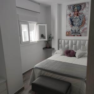 Postel nebo postele na pokoji v ubytování Apartamentos Sol y Luna Conil