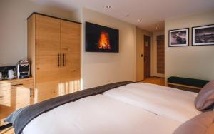 Postel nebo postele na pokoji v ubytování Hotel Tannenhof