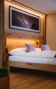 Postel nebo postele na pokoji v ubytování Hotel Tannenhof