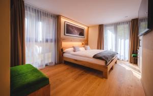 Postel nebo postele na pokoji v ubytování Hotel Tannenhof