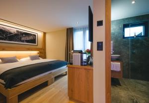 Postel nebo postele na pokoji v ubytování Hotel Tannenhof