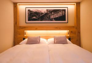 Postel nebo postele na pokoji v ubytování Hotel Tannenhof