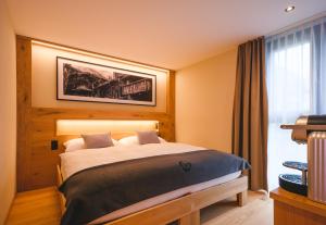 Postel nebo postele na pokoji v ubytování Hotel Tannenhof