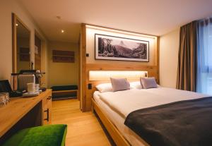 Postel nebo postele na pokoji v ubytování Hotel Tannenhof