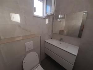 Koupelna v ubytování Apartments Bartulić
