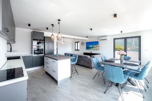 Kuchyň nebo kuchyňský kout v ubytování Paladium Exclusive Apartment
