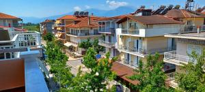 an overhead view of a city with houses at APARTMENTS HARIS in Olympiaki Akti