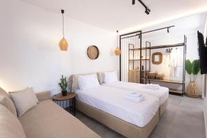 Postel nebo postele na pokoji v ubytování Petra Luxury Suites